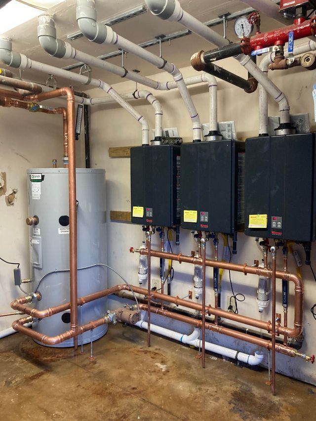 Copper piping and water-heater equipment in a mechanical room